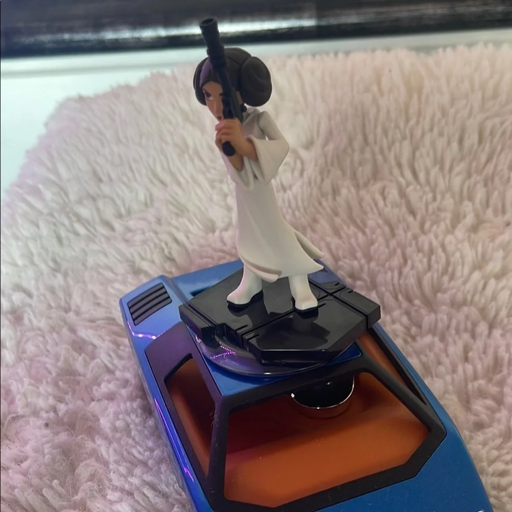 Princess Figure on Blue Toy Car